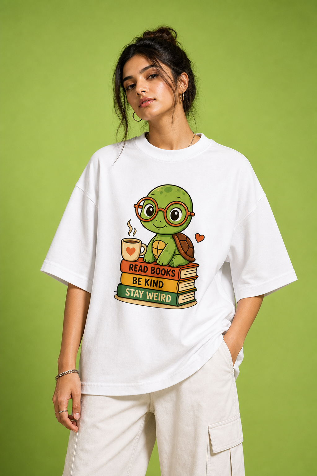 Read Books Be Kind Stay Weird Unisex Oversized Tee in white - female model