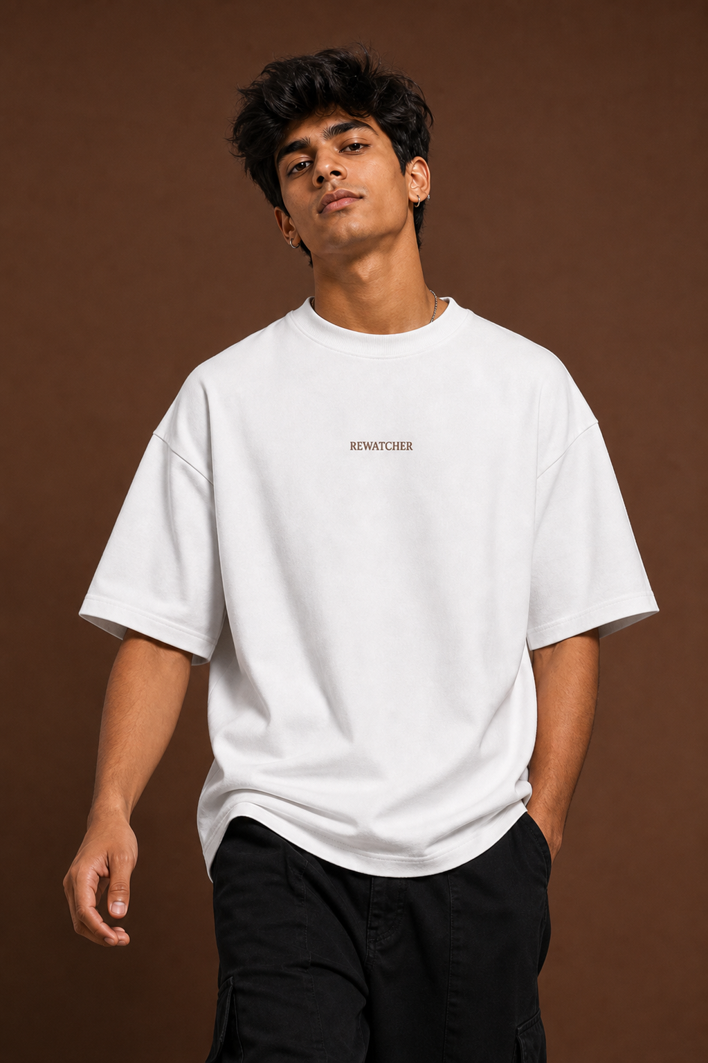 The Rewatcher Unisex Oversized Tee in white - male model