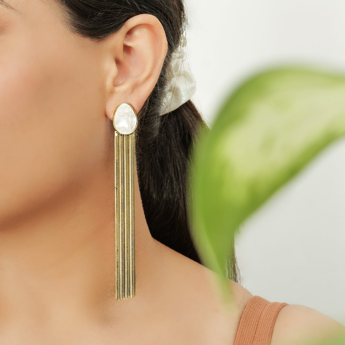 Medusa Earrings – worn by a model