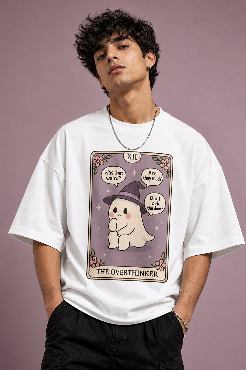 The Overthinker Unisex Oversized Tee in white - male model